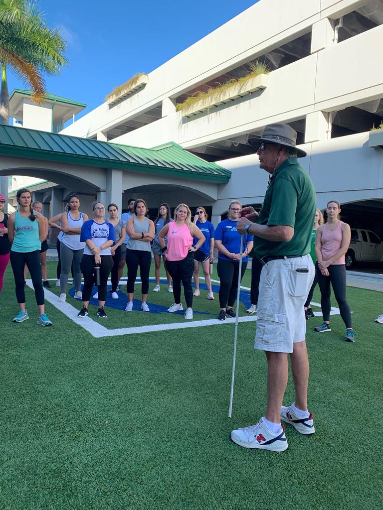 white cane day instructor with participants